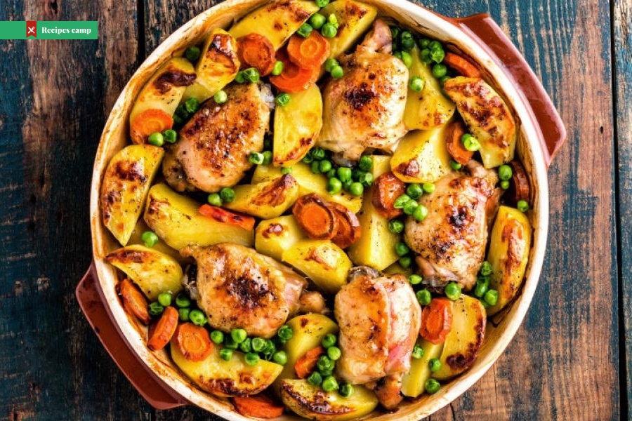 Chicken roasted on a bed of vegetables
